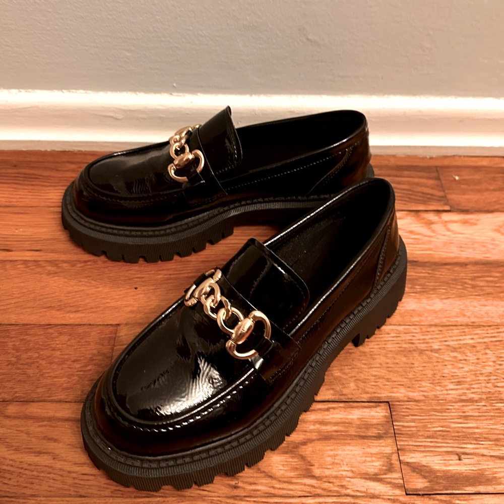 Women’s loafers with buckle detail